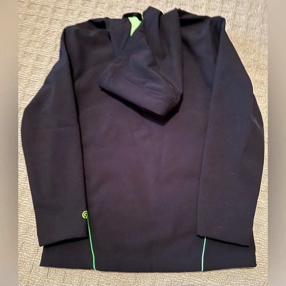 Champion Outdoor Coat/Jacket in black with green accents Boys size L (12/14)